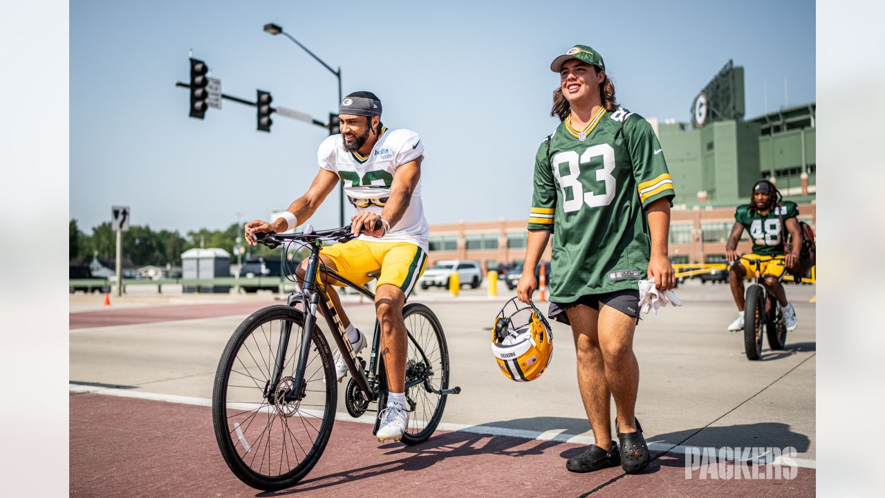 Photos: Packers take one last bike ride to training camp practice