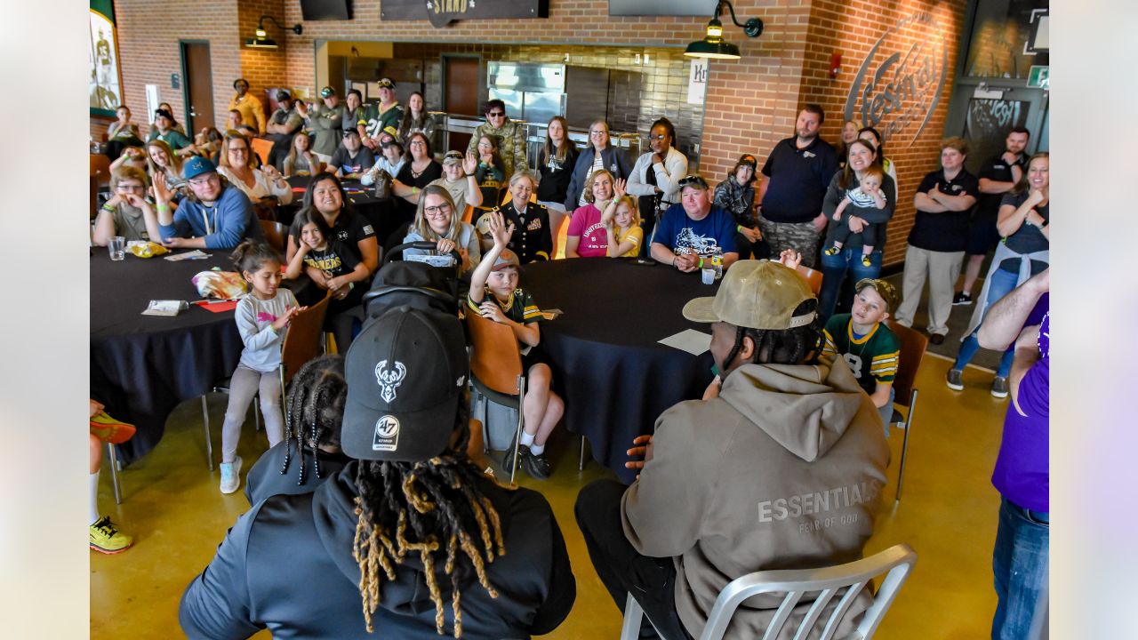 Military families meet Packers' Jones, shop for free at