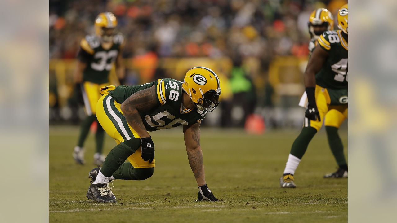 Green Bay Packers, Julius Peppers seek a balance on playing time