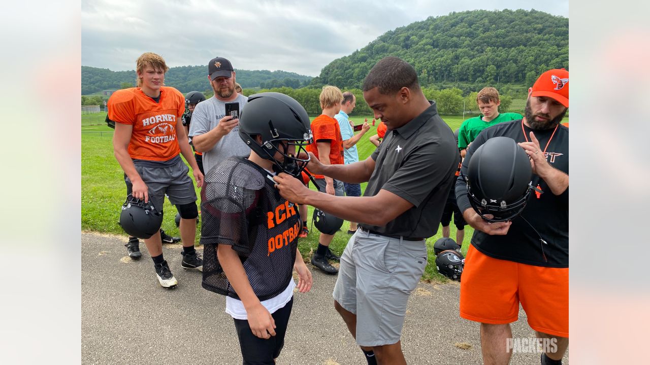 Packers Give Back, American Family Insurance to donate new helmets to 10  high school football teams in Wisconsin