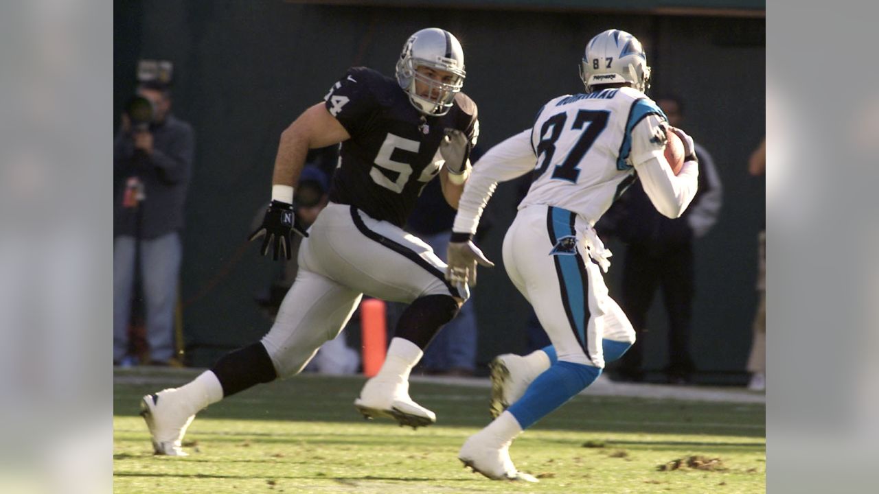 Carolina Panthers' Muhsin Muhammad (87) is tackled by Atlanta