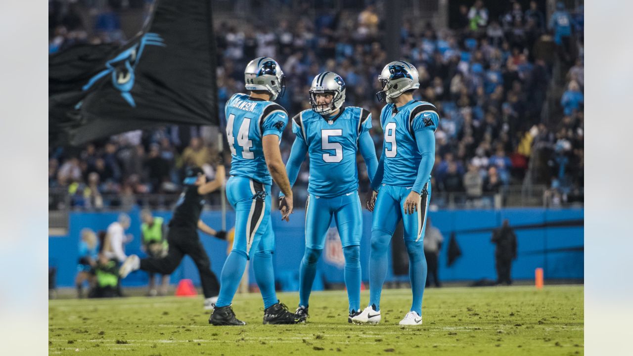 Carolina Panthers place kicker Eddy Pineiro (4) slaps hands with long  snapper JJ Jansen (44) after kicking an extra-point during an NFL football  game against the New Orleans Saints, Sunday, Sep. 25