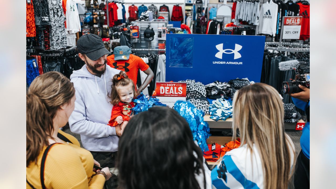 Austin Corbett, Panthers host holiday shopping spree at Academy