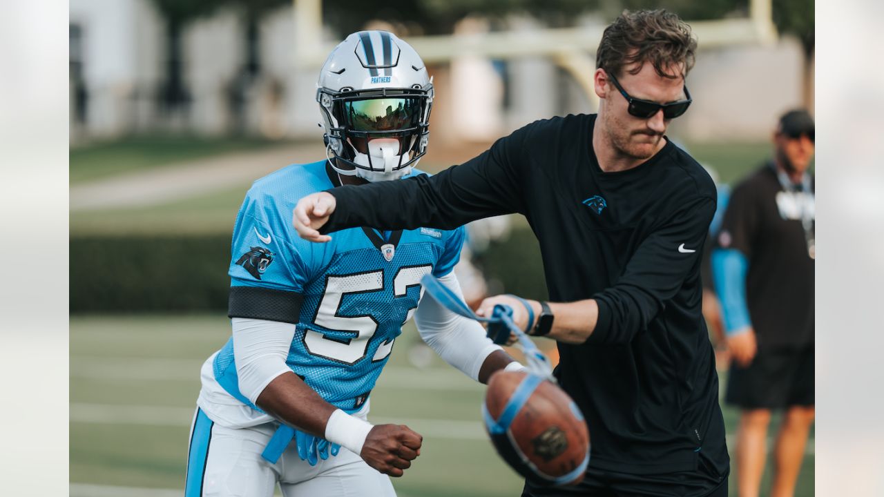 Carolina Panthers defensive players rest during a break from practice at  the NFL football team's training camp in Spartanburg, S.C., Thursday, July  29, 2021. (AP Photo/Nell Redmond Stock Photo - Alamy