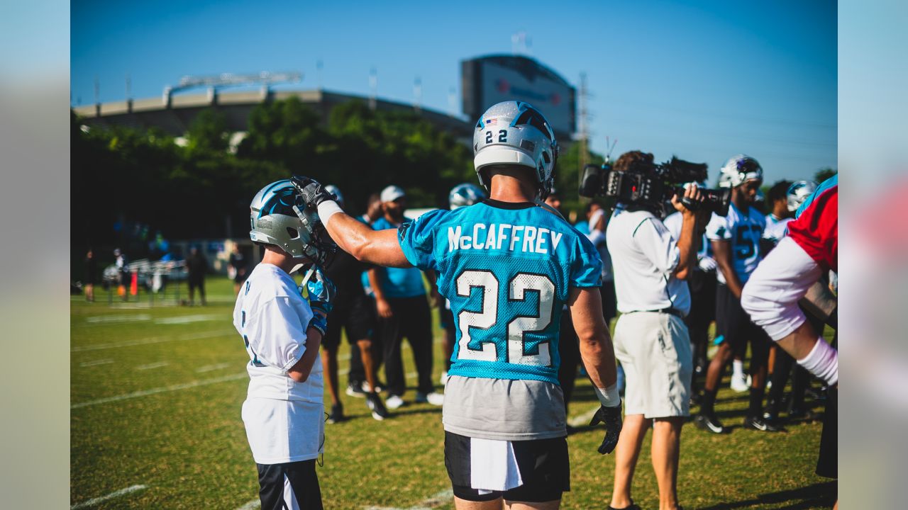 Christian McCaffrey helps grant the wish of a young Panthers fan