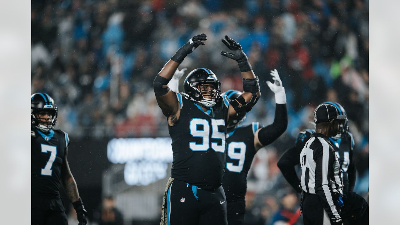 Atlanta Falcons vs. Carolina Panthers. NFL Game. American Football League  match. Silhouette of professional player celebrate touch down. Screen in  bac Stock Photo - Alamy