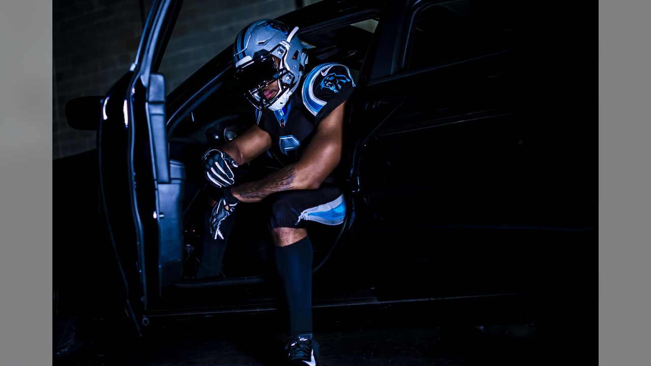 Panthers add a twist to all black uniform combo for Detroit game