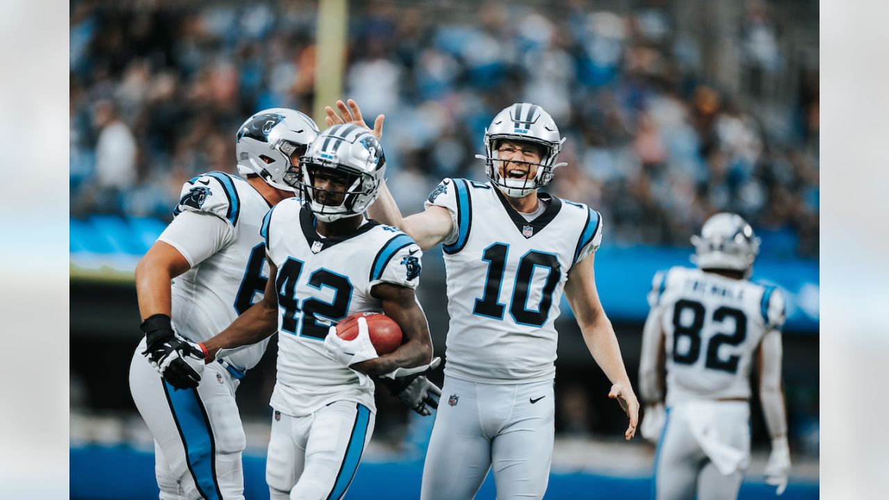 Carolina Panthers wide receiver D.J. Moore warms up before the first half  of an NFL football game against the New York Jets Sunday, Sept. 12, 2021,  in Charlotte, N.C. (AP Photo/Jacob Kupferman