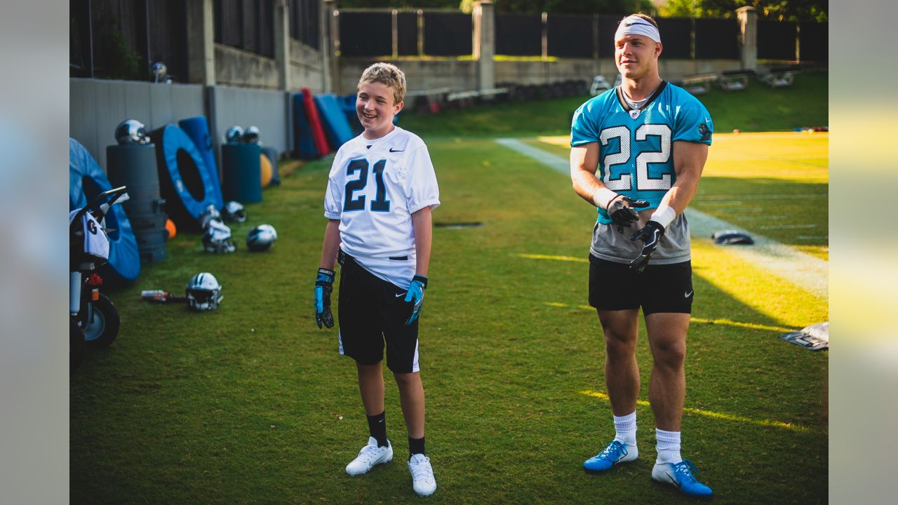 Christian McCaffrey helps grant the wish of a young Panthers fan