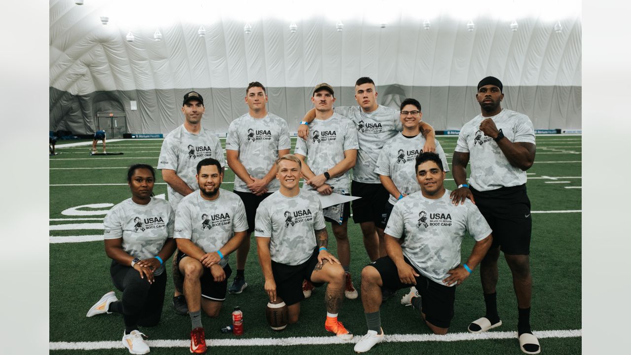 Military members take part in USAA's Salute to Service NFL Boot Camp