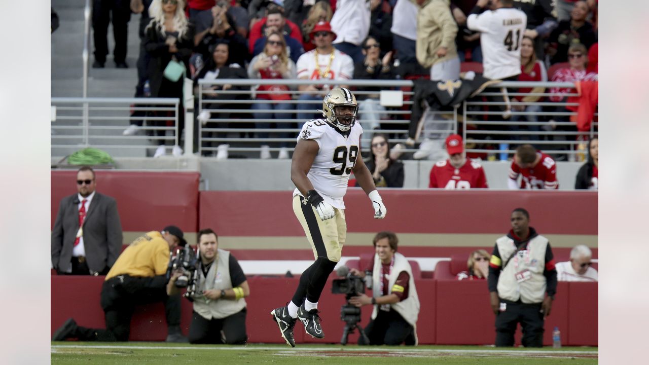 New Orleans Saints defensive tackle Shy Tuttle (99) walks on the sideline  during an NFL football game against the Minnesota Vikings at Tottenham  Hotspur Stadium, Sunday, Oct. 2, 2022, in London. The