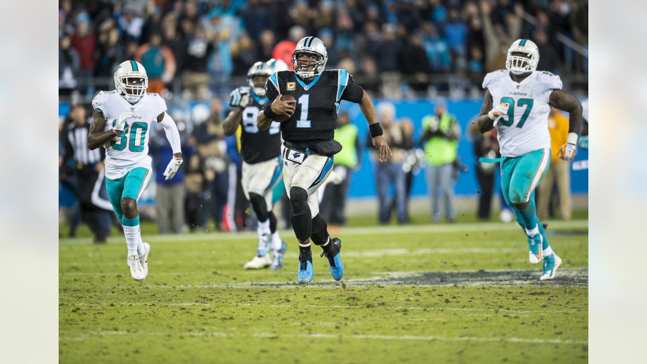 Carolina Panthers' Cam Newton (1) wears special cleats as he warms up  before an NFL football game against the Miami Dolphins in Charlotte, N.C.,  Monday, Nov. 13, 2017. (AP Photo/Bob Leverone Stock