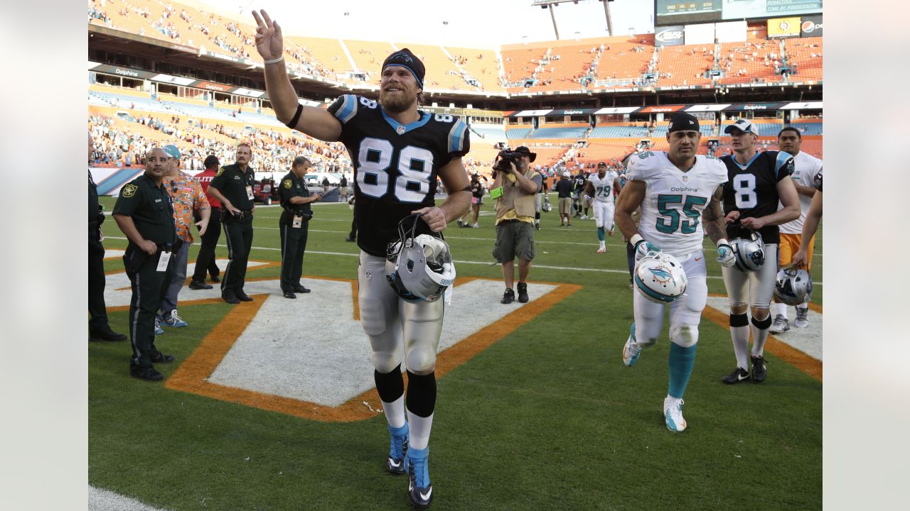 Miami Dolphins tight end Mike Gesicki (88) waves to the fans as he  celebrates the Dolphins defeating the Houston Texans during an NFL football  game, Sunday Nov. 7, 2021, in Miami Gardens