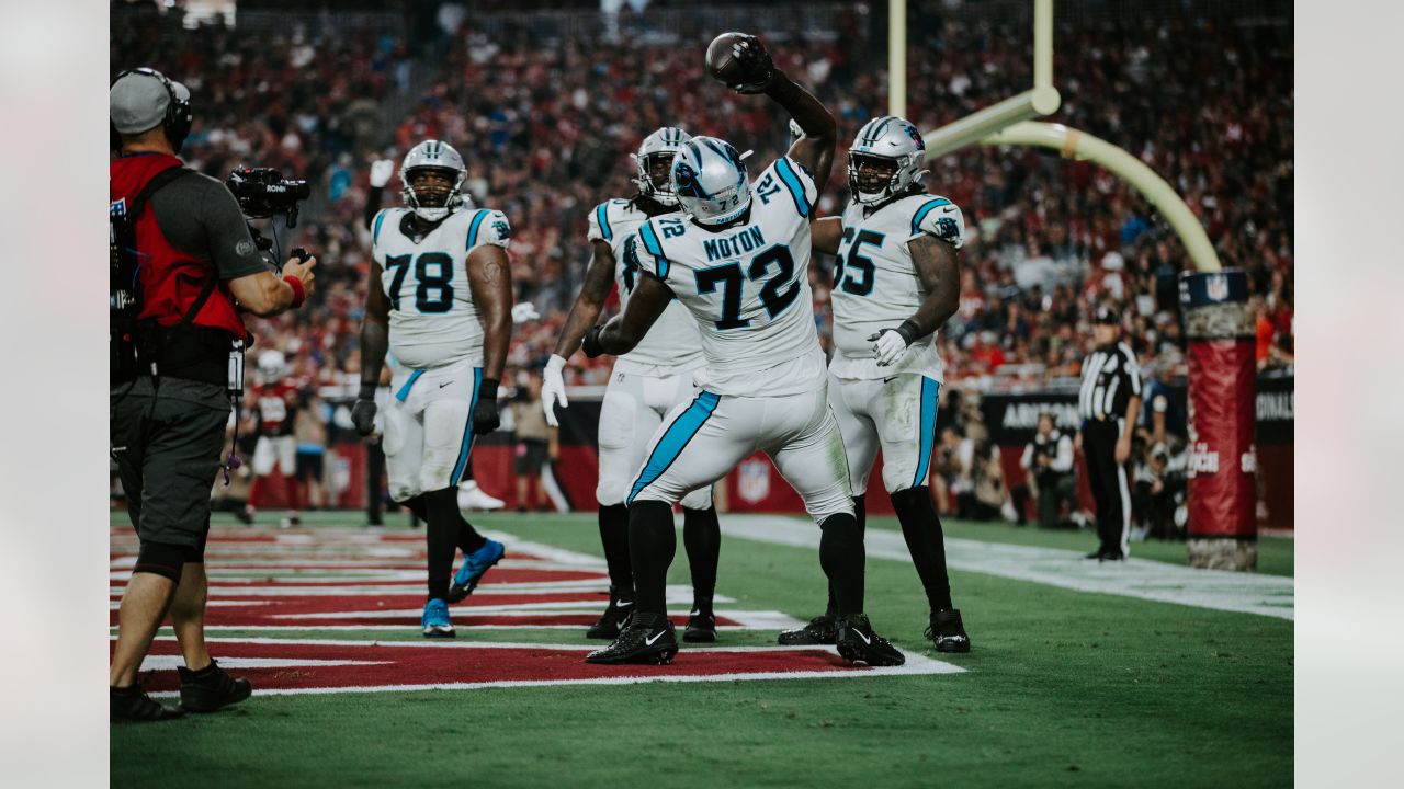 Carolina Panthers' Taylor Moton (72) runs a drill during the NFL