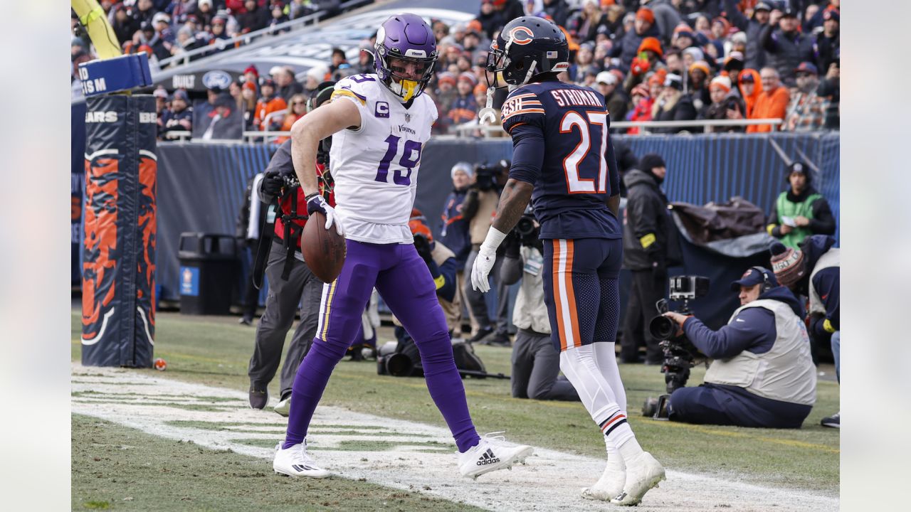 Minnesota Vikings wide receivers Justin Jefferson (18) and Adam Thielen (19)  celebrate after Jefferson scored a touchdown against the New York Jets,  during the second half of an NFL football game Sunday