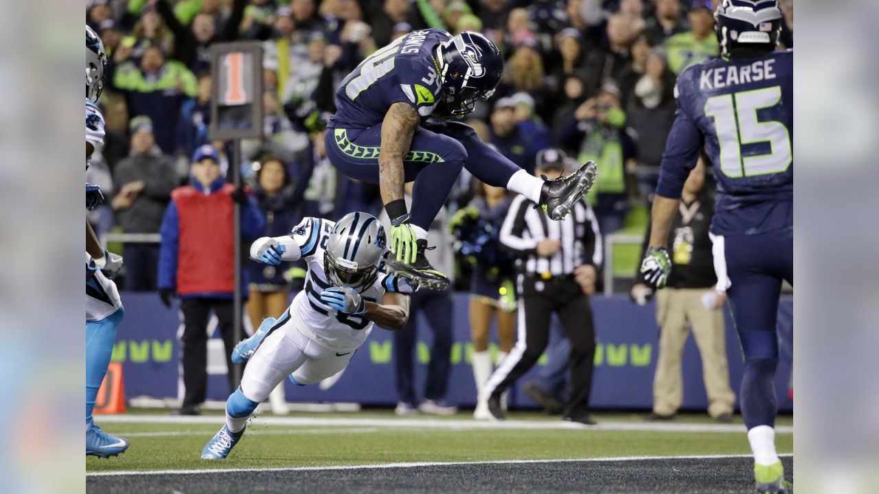 Seattle Seahawks including Thomas Rawls (34) and Cassius Marsh