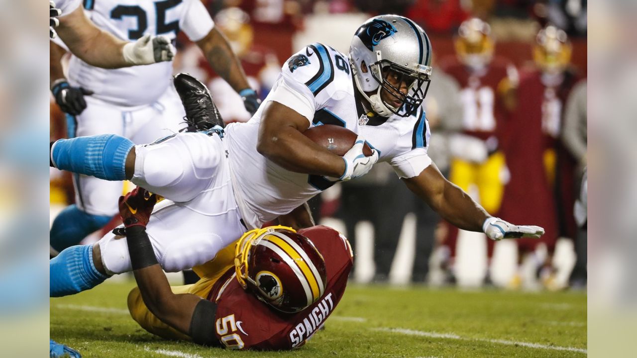 Carolina Panthers defensive end Wes Horton (96) grabs a fumble by