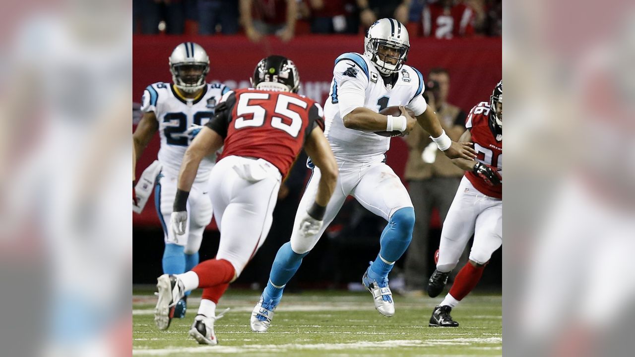 Carolina Panthers safety Tre Boston (33) celebrates with quarterback Cam  Newton (1) after his interception and 84-yard touchdown run against the  Atlanta Falcons during the second half of their NFL game at