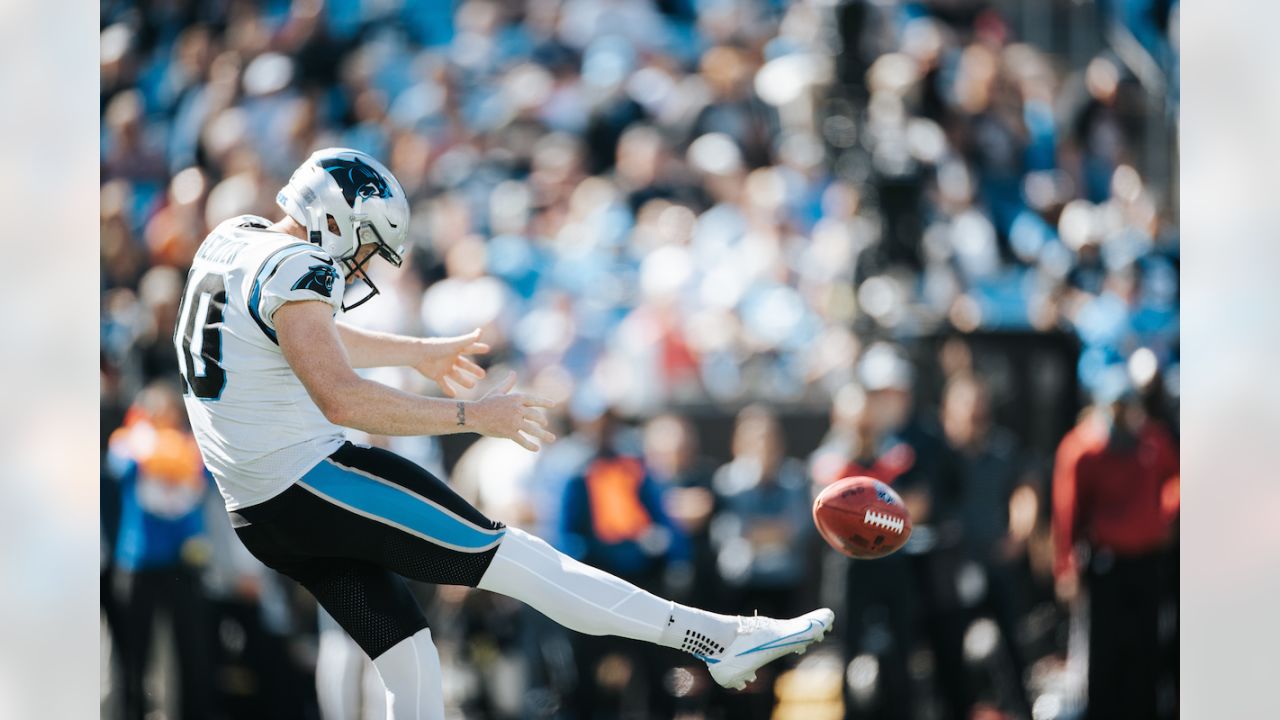 Tampa Bay Buccaneers vs. Carolina Panthers. NFL Game. American Football  League match. Silhouette of professional player celebrate touch down.  Screen in background. Stock Photo