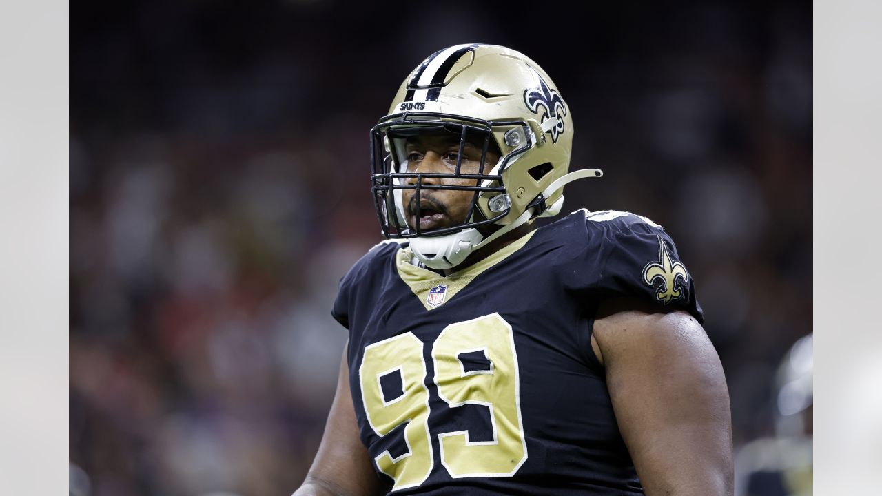 New Orleans Saints defensive end Cameron Jordan (94) celebrates after a  play during an NFL football game against the Seattle Seahawks, Sunday, Oct.  9, 2022, in New Orleans. (AP Photo/Tyler Kaufman Stock