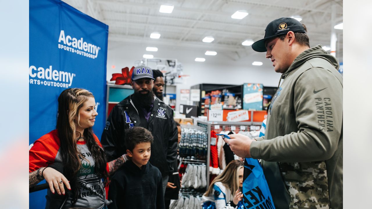 Austin Corbett, Panthers host holiday shopping spree at Academy