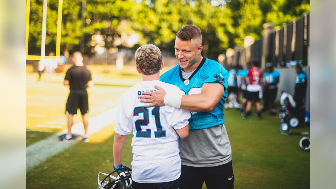 Christian McCaffrey helps grant the wish of a young Panthers fan