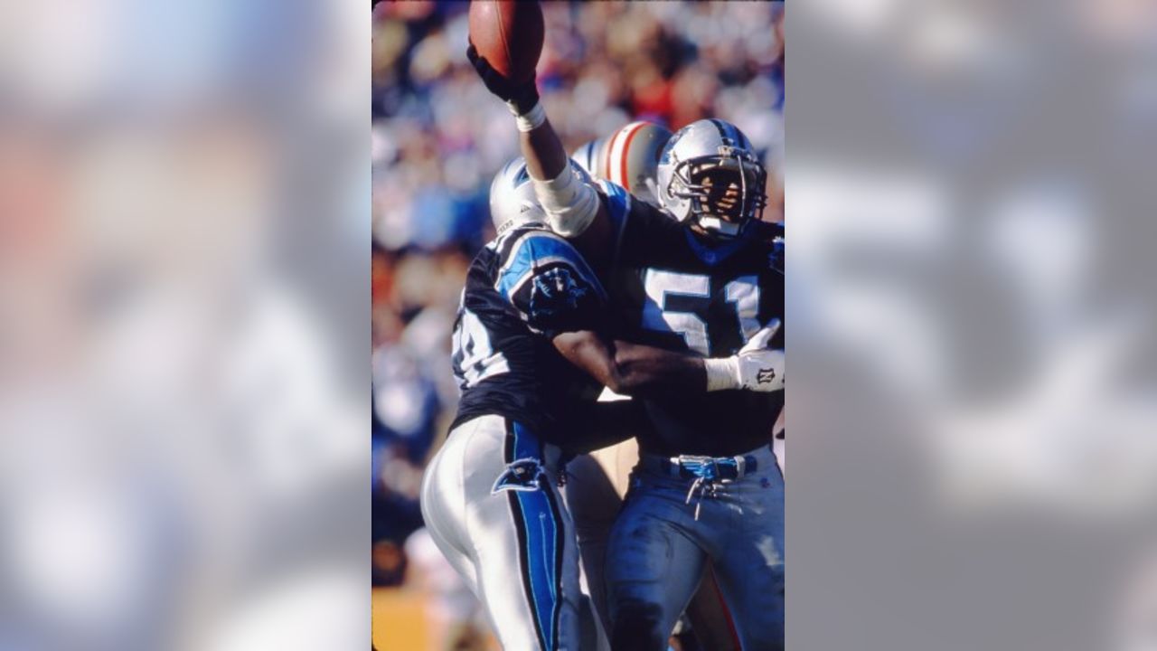 Melanie Mills, widow of former NFL player Sam Mills, waves to the crowd as  the Carolina Panthers honored Sam Mills during an NFL football game between  the Carolina Panthers and the Arizona