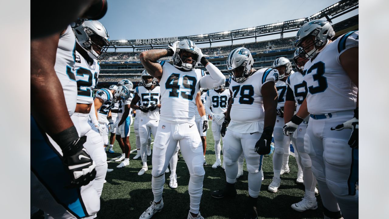 Carolina Panthers linebacker Frankie Luvu (49) takes the field