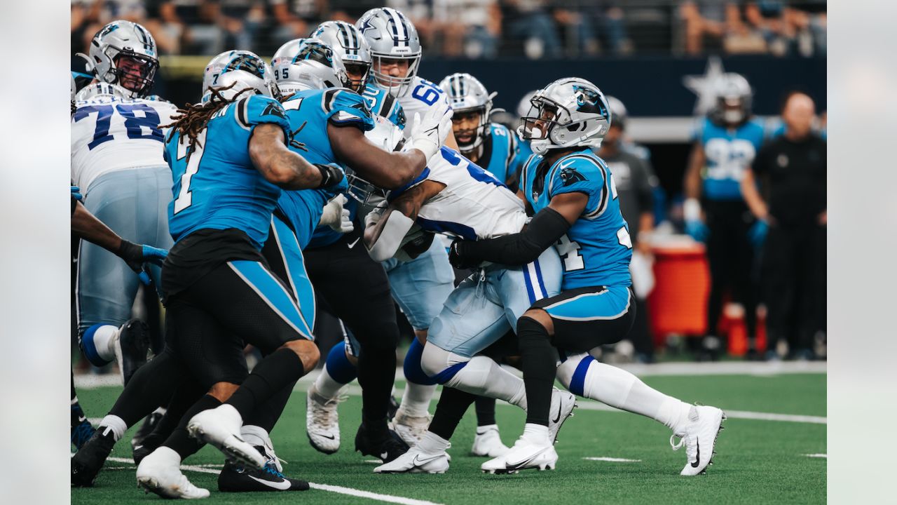 Carolina Panthers safety Sean Chandler, left, tackles New England