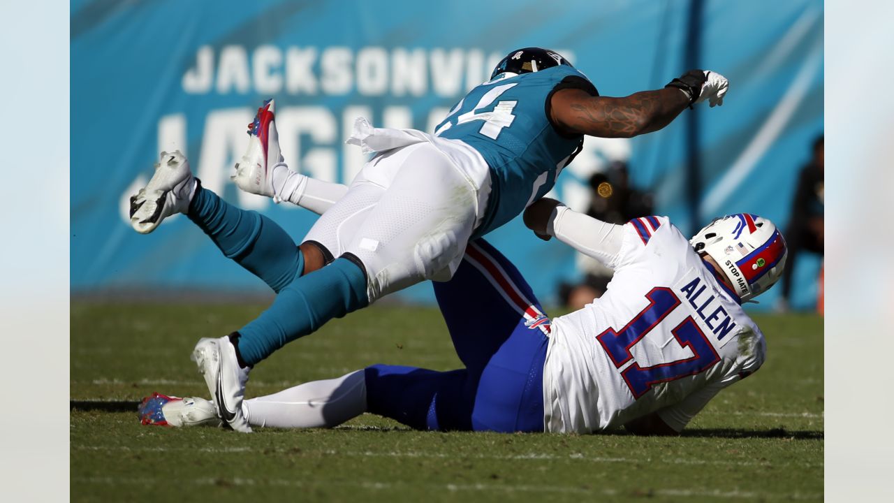 Carolina Panthers linebacker Damien Wilson watches during the first have of  an NFL preseason football game against the Buffalo Bills on Friday, Aug.  26, 2022, in Charlotte, N.C. (AP Photo/Jacob Kupferman Stock