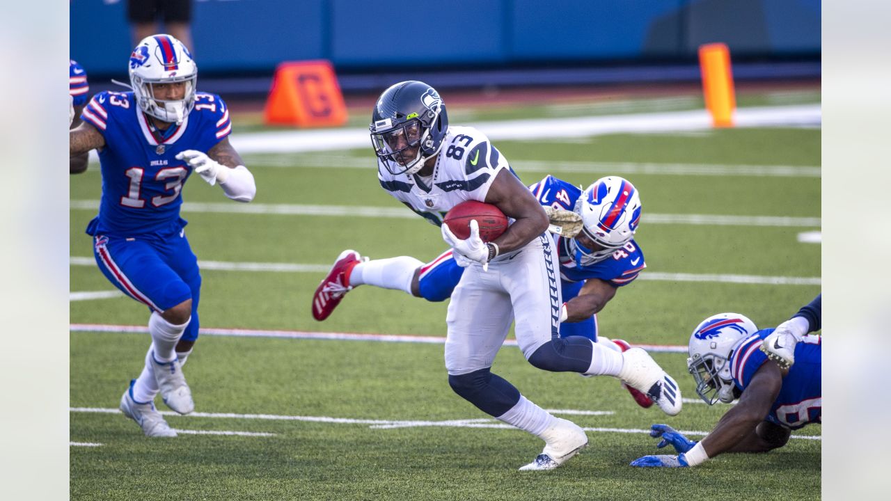 Seattle Seahawks wide receiver DK Metcalf (14) runs a pass route against  the Buffalo Bills during the first half of an NFL football game, Sunday,  Nov. 8, 2020, in Orchard Park, N.Y. (