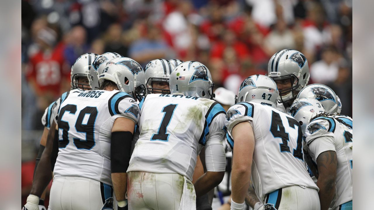 Carolina Panthers quarterback Cam Newton (1) leads a huddle during