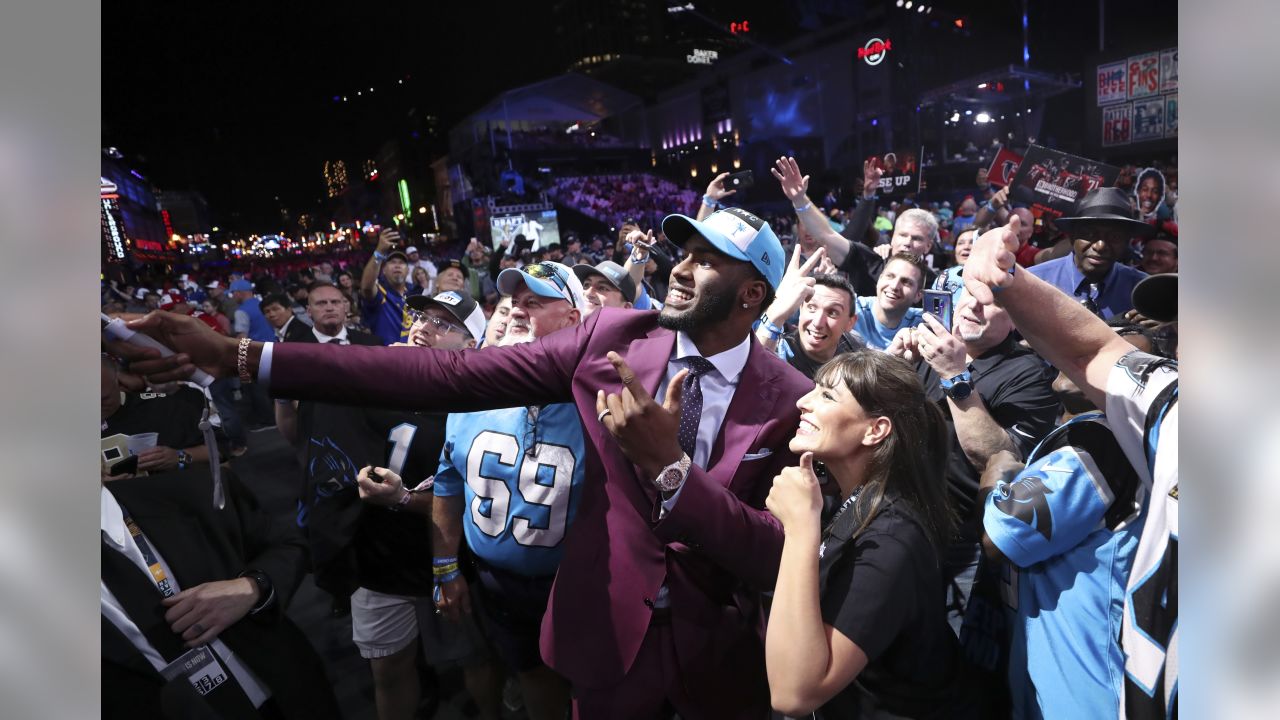 NFL Draft: Brian Burns shows off his cranberry suit in a bathroom