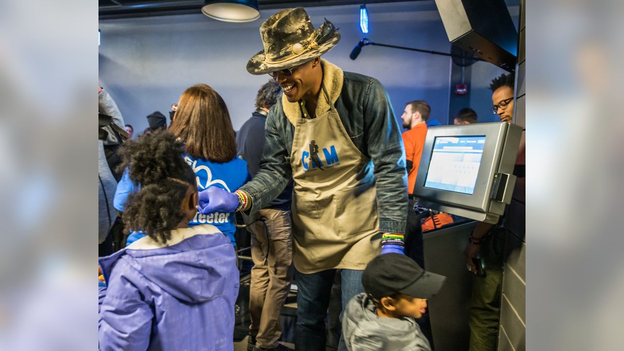 Cam Newton holds annual 'Thanksgiving Jam' for 1,200 children and their  families 