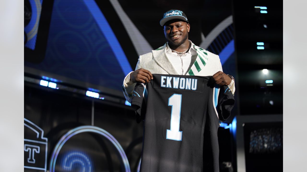 North Carolina State offensive tackle Ikem Ekwonu poses for photos after  being picked by the Carolina Panthers with the sixth pick of the NFL  football draft Thursday, April 28, 2022, in Las