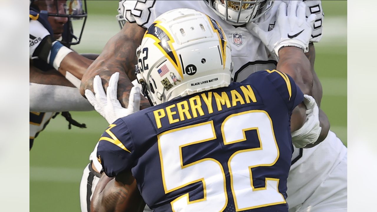 Las Vegas Raiders linebacker Denzel Perryman (52) makes a tackle