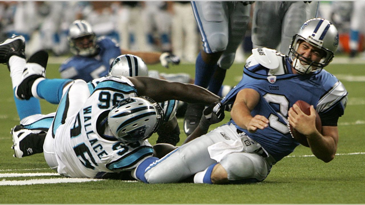 Detroit Lions quarterback Joey Harrington (#3) runs for a 26-yard