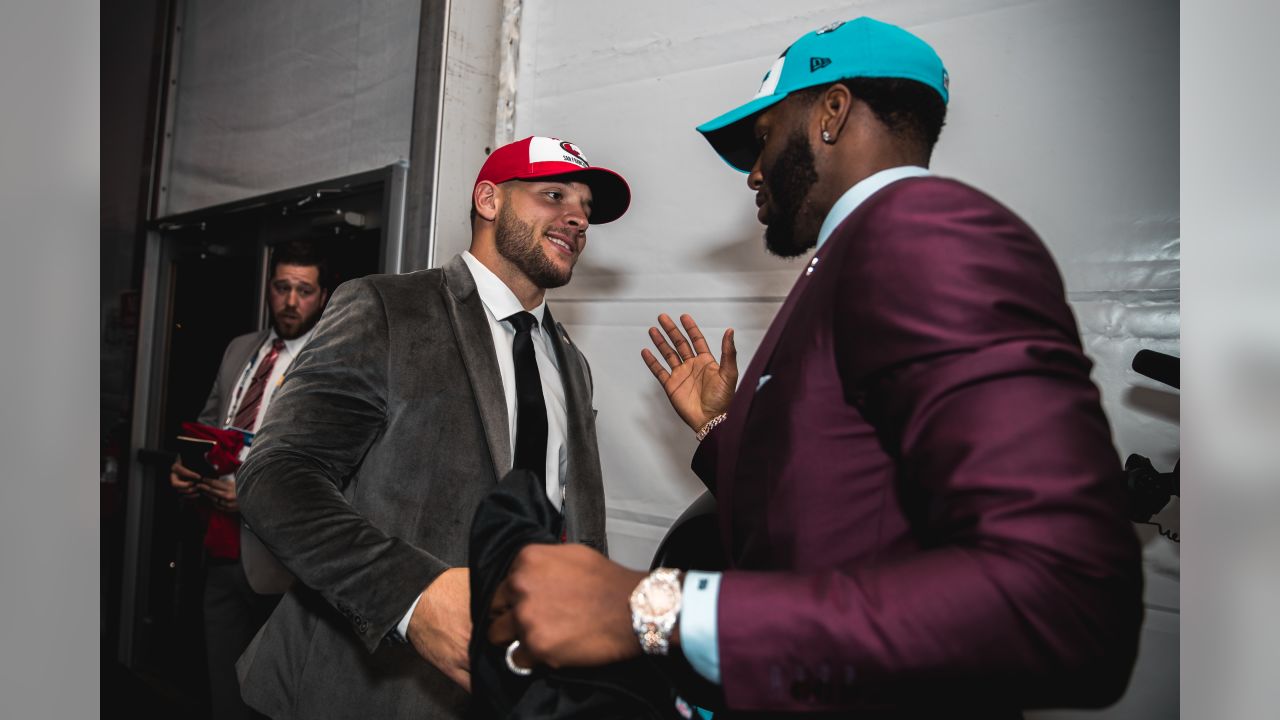 NFL Draft: Brian Burns shows off his cranberry suit in a bathroom