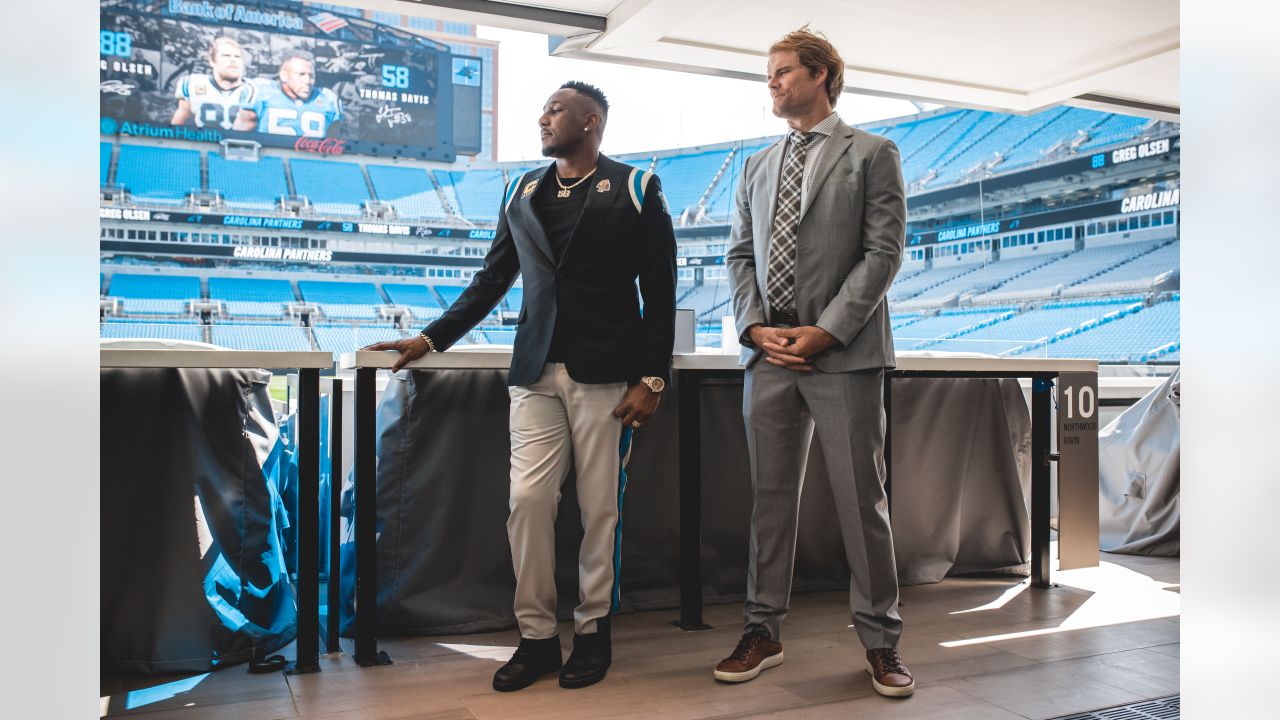 Carolina Panthers' Greg Olsen (88) celebrates with Cam Newton (1