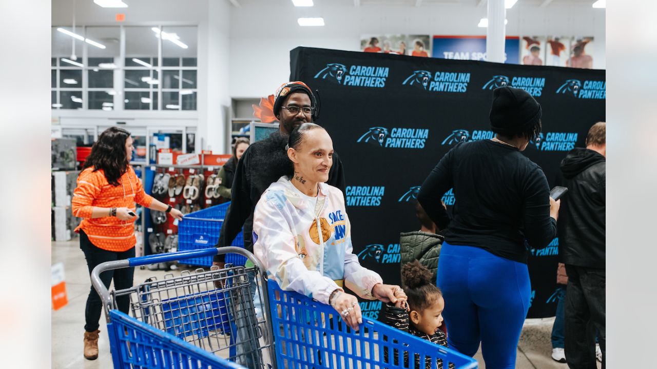 Austin Corbett, Panthers host holiday shopping spree at Academy