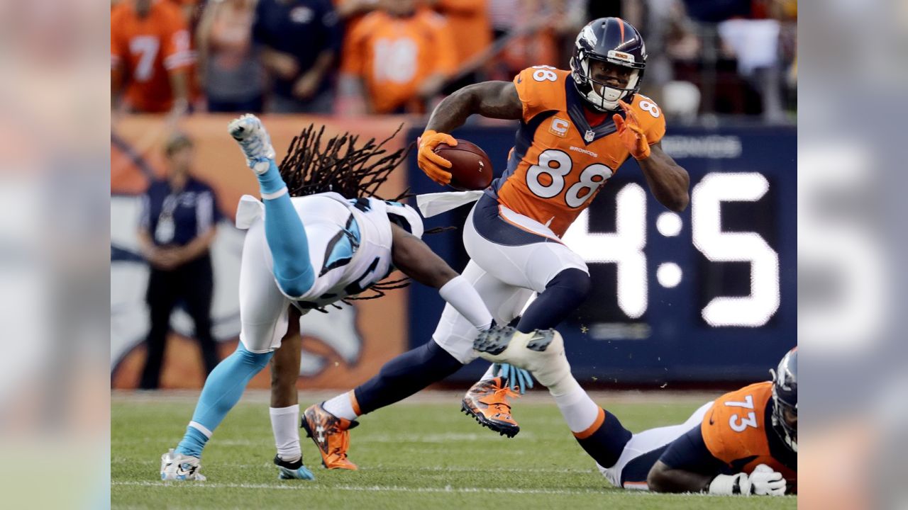 Denver Broncos wide receiver Demaryius Thomas (88) and running back C.J.  Anderson (22) celebrate after Thomas made a touchdown catch in the first  half of an NFL football game against the Pittsburgh