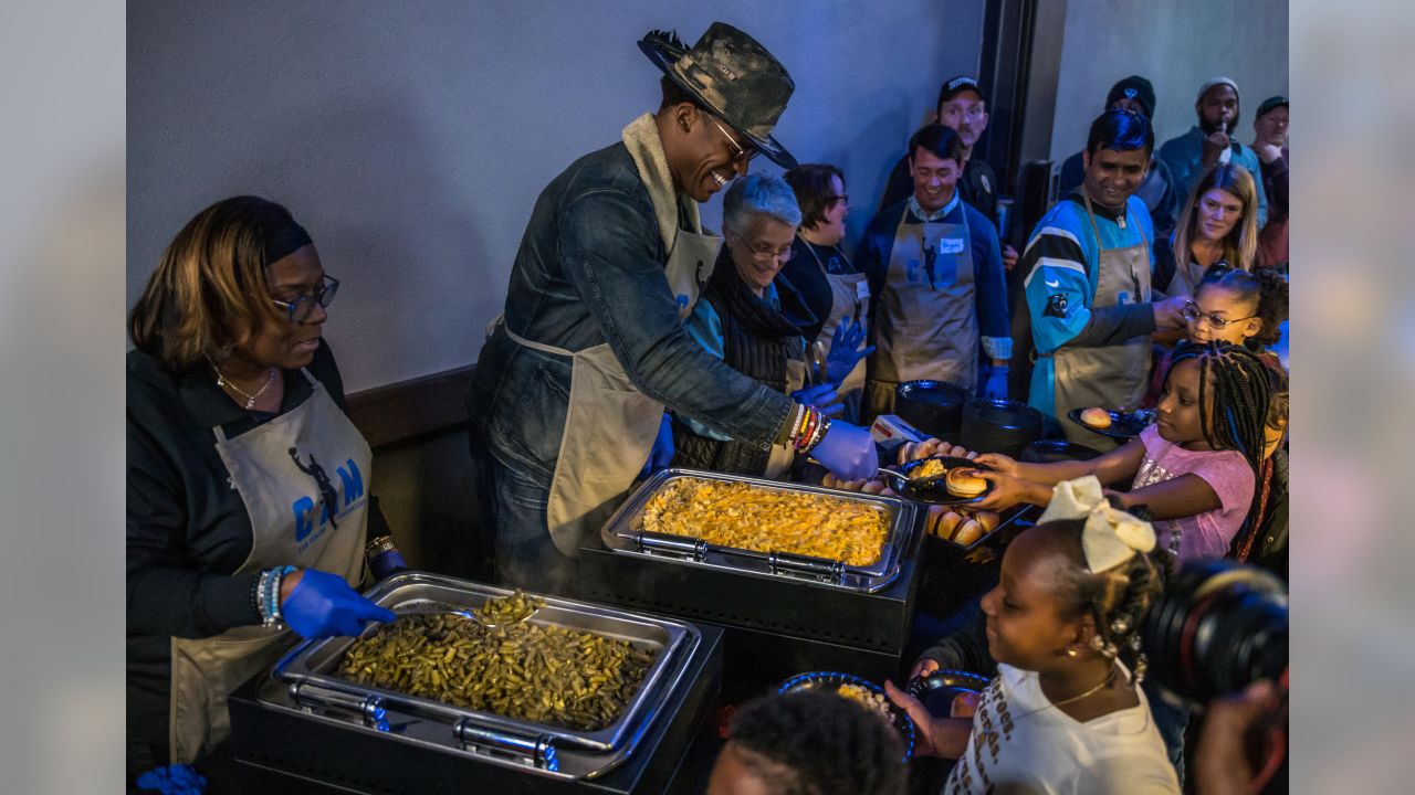 Cam Newton holds annual 'Thanksgiving Jam' for 1,200 children and their  families 