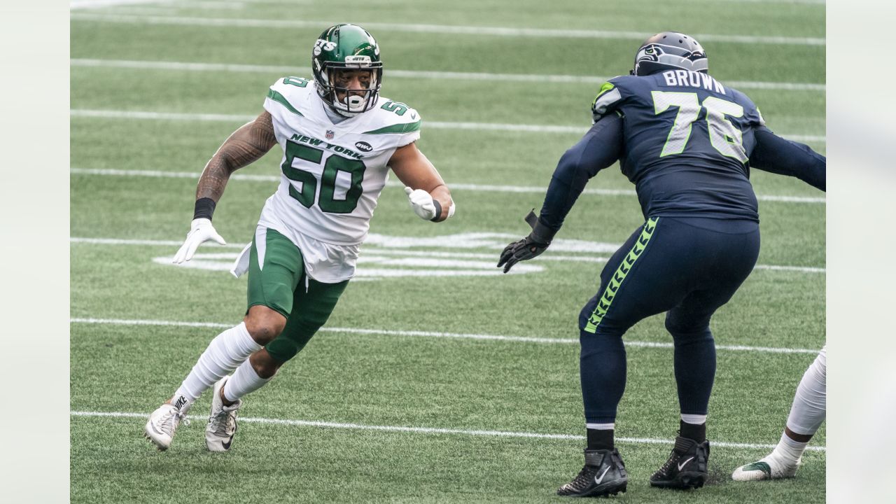 New York Jets linebacker Frankie Luvu (50) and strong safety Jamal