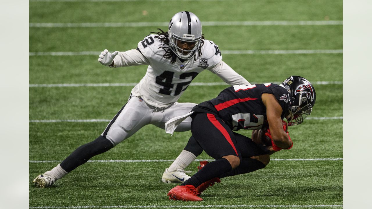 Las Vegas Raiders inside linebacker Cory Littleton (42) and Divine Deablo  (5) during the second half of an NFL football game against the Philadelphia  Eagles, Sunday, Oct. 24, 2021, in Las Vegas. (