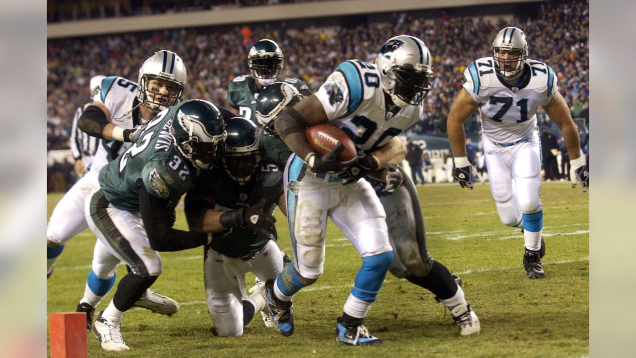 Carolina Panthers' running back DeShaun Foster puts his hand to the News  Photo - Getty Images