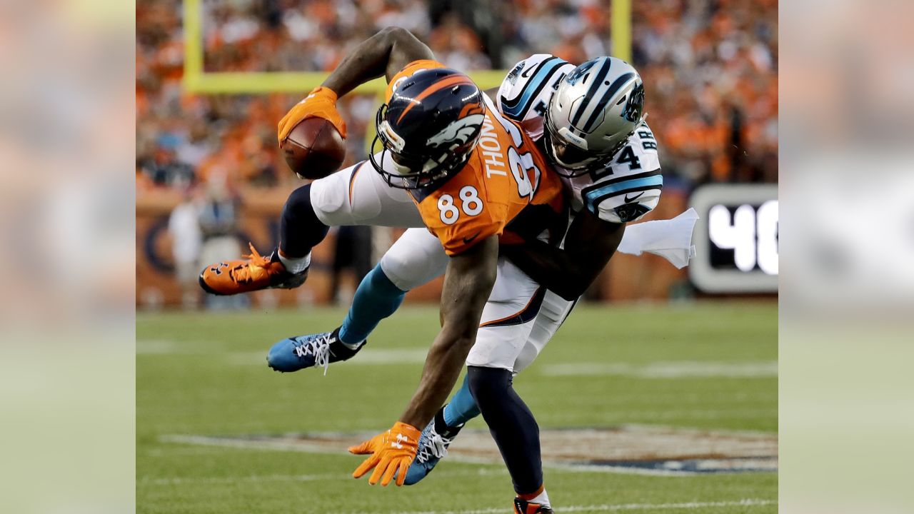 Denver Broncos wide receiver Demaryius Thomas (88) and running back C.J.  Anderson (22) celebrate after Thomas made a touchdown catch in the first  half of an NFL football game against the Pittsburgh