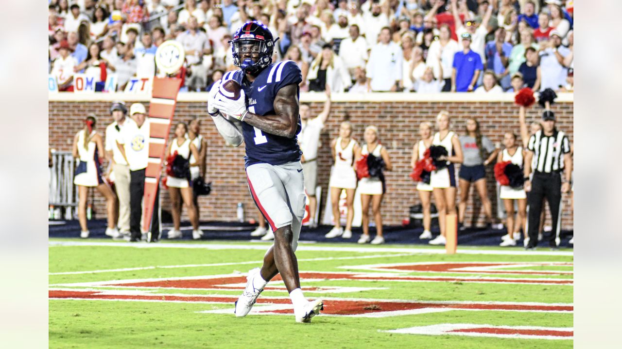 DK Metcalf Ole Miss Rebels Unsigned White Jersey Running Photograph