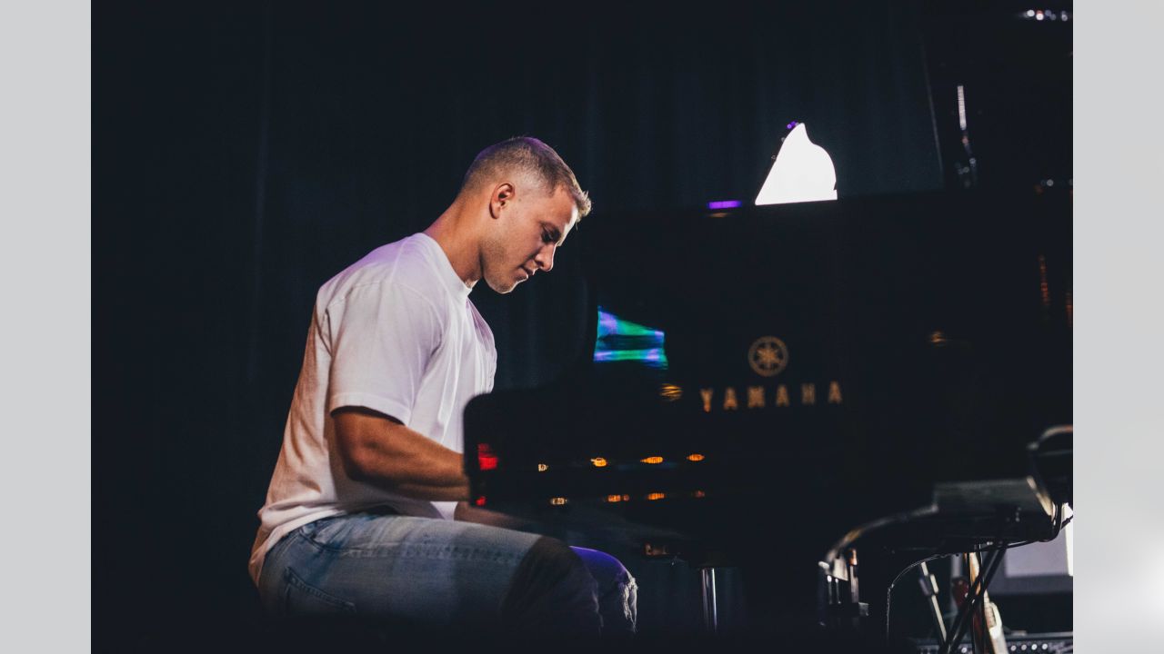 Off the Field: Christian McCaffrey Wows with Piano Solo at Zach Bryan  Concert 