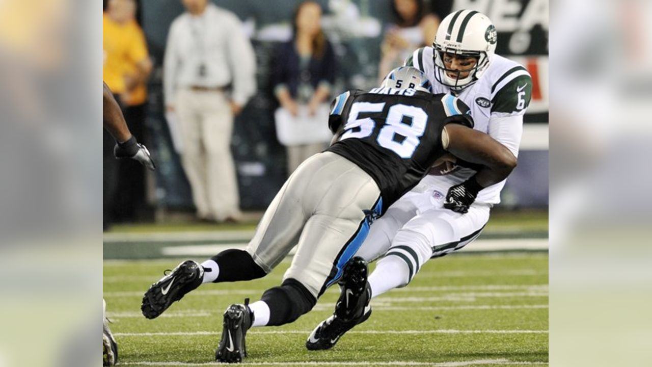 New York Jets defensive end Quinton Coples (98) knocks the ball