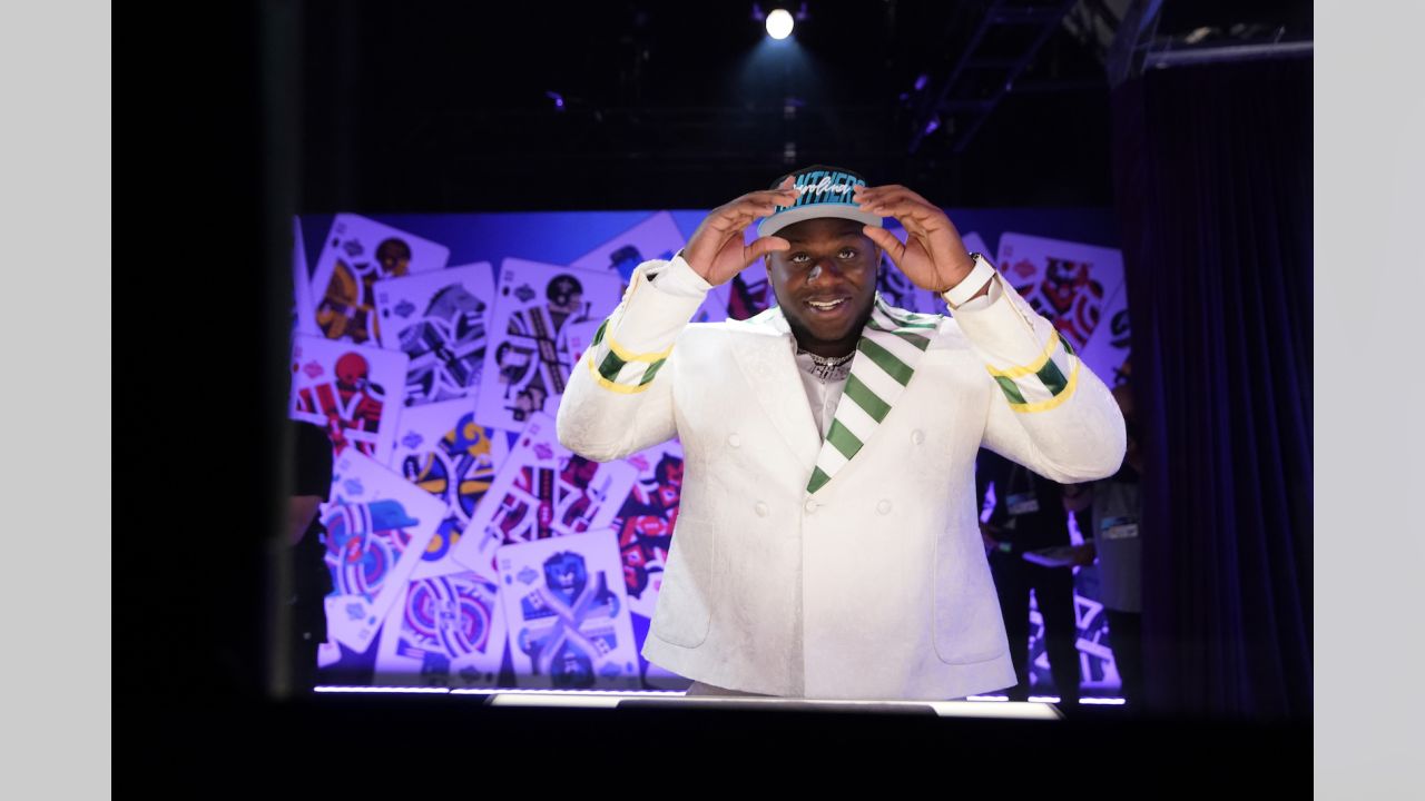 North Carolina State offensive tackle Ikem Ekwonu stands with NFL  Commissioner Roger Goodell after being picked by the Carolina Panthers with  the sixth pick of the NFL football draft Thursday, April 28